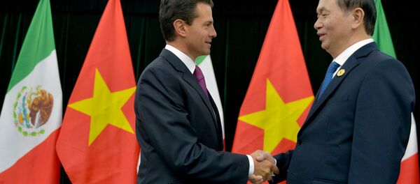El presidente de México, Enrique Peña Nieto, y su homólogo vietnamita, Tran Dai Quang - Sputnik Mundo