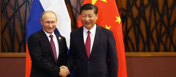 El presidente de Rusia, Vladímir Putin, y el presidente de China, Xi Jiping - Sputnik Mundo
