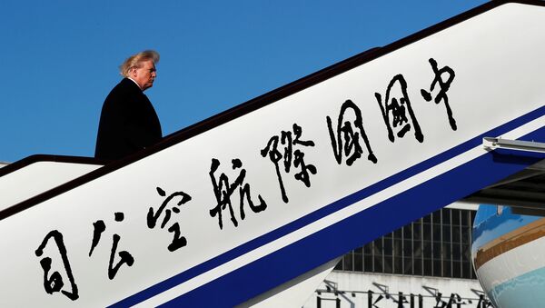 Donald Trump, presidente de EEUU, durante su visita a China Donald Trump, presidente de EEUU, durante su visita a China - Sputnik Mundo
