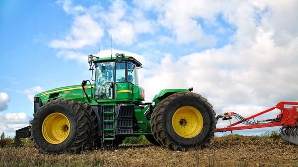 Un tractor (imagen referencial) - Sputnik Mundo