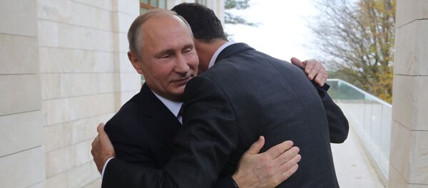 Vladímir Putin en una reunión con Bashar Asad (archivo) - Sputnik Mundo