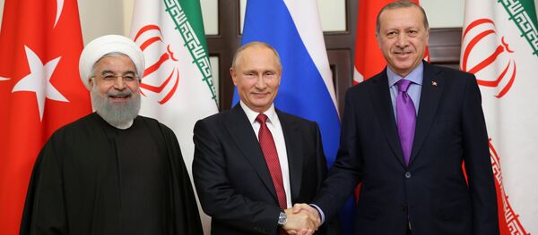 Presidente de Rusia, Vladímir Putin, presidente de Irán, Hasán Rohaní y su homólogo turco, Recep Tayyip Erdogan Presidente de Rusia, Vladímir Putin, presidente de Irán, Hasán Rohaní y su homólogo turco, Recep Tayyip Erdogan - Sputnik Mundo