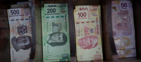 Pesos mexicanos (imagen referencial) Pesos mexicanos (imagen referencial) - Sputnik Mundo