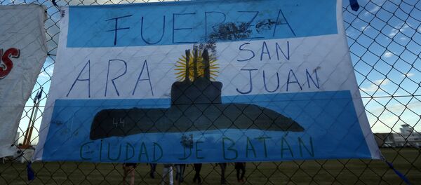 Un cartel en apoyo a las víctimas del ARA San Juan - Sputnik Mundo