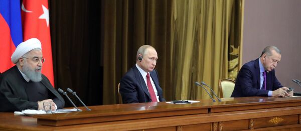 Los presidentes de Rusia, Turquía e Irán, Vladímir Putin, Recep Tayyip Erdogan y Hasán Rohaní - Sputnik Mundo