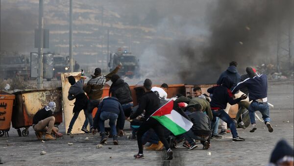 Participants in a protest in Palestine against the decision to recognize Jerusalem as the capital of Israel - Sputnik Mundo