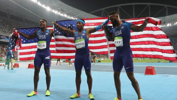 Miembros del equipo de EEUU, Justin Gatlin, Mike Rodgers y Tyson Gay en los JJOO 2016 de Río de Janeiro - Sputnik Mundo