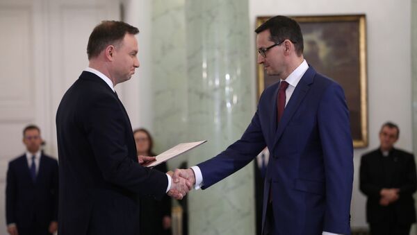 El primer ministro de Polonia, Mateusz Morawiecki y el presidente del país, Andrzej Duda - Sputnik Mundo