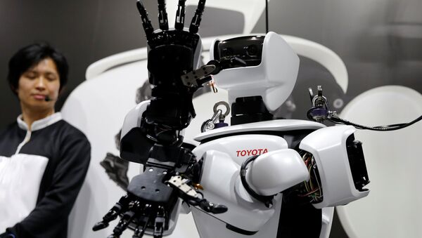 El robot humanoide de Toyota El robot humanoide de Toyota - Sputnik Mundo