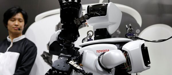 El robot humanoide de Toyota El robot humanoide de Toyota - Sputnik Mundo