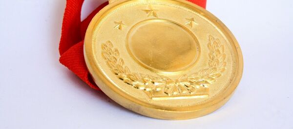 Una medalla de oro, imagen referencial - Sputnik Mundo