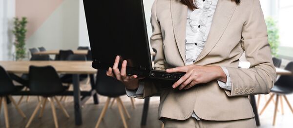 Una mujer de negocio - Sputnik Mundo