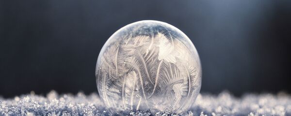Una bola de hielo, imagen referencial - Sputnik Mundo