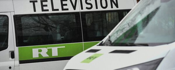 El logo de RT - Sputnik Mundo