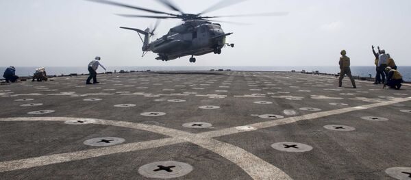 Un helicóptero estadounidense CH-53E Un helicóptero estadounidense CH-53E - Sputnik Mundo