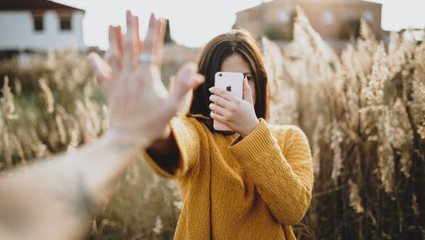 Un iPhone - Sputnik Mundo