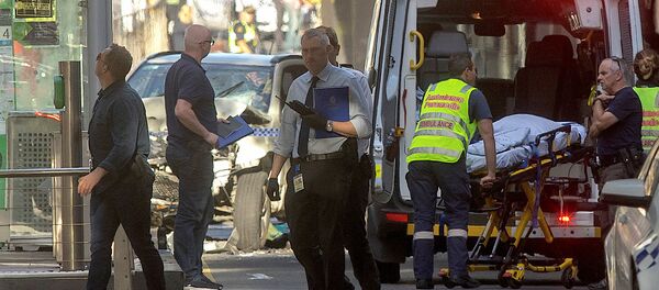 Policía australiana en el lugar del atropello en Melbourne - Sputnik Mundo