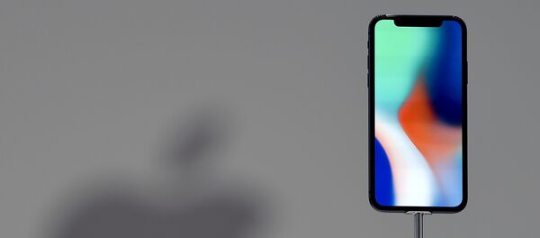 Un iPhone X - Sputnik Mundo