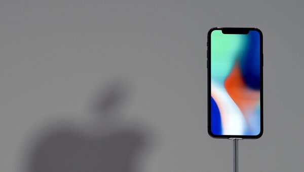 Un iPhone X - Sputnik Mundo