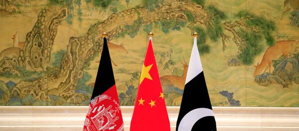 Banderas de Afganistán, China y Pakistán - Sputnik Mundo