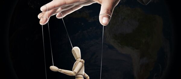 Una mano y un títere - Sputnik Mundo