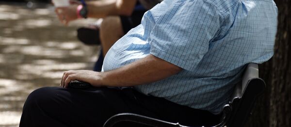 Una persona con sobrepeso (imagen referencial) - Sputnik Mundo