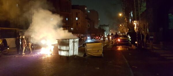 People protest in Tehran, Iran December 30, 2017 in this picture obtained from social media - Sputnik Mundo