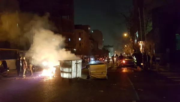 People protest in Tehran, Iran December 30, 2017 in this picture obtained from social media - Sputnik Mundo