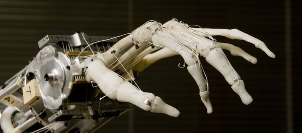 Una mano robótica (archivo) - Sputnik Mundo