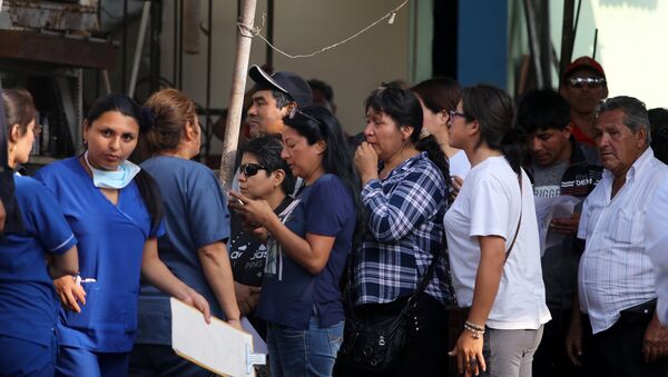 Familiares de las víctimas del accidente con autobús en Perú - Sputnik Mundo