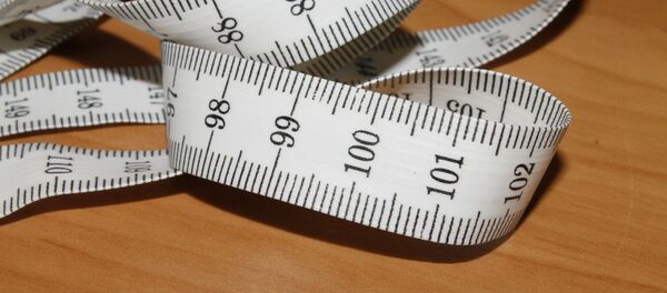 una cinta de medir - Sputnik Mundo