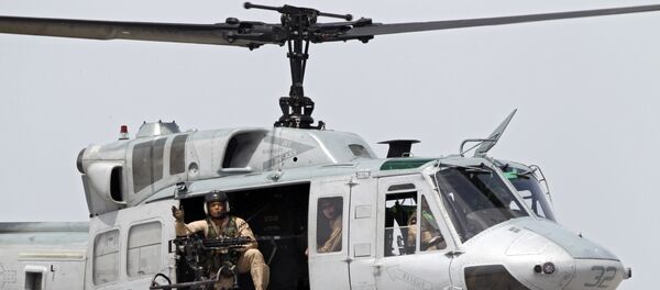 Un helicóptero estadounidense UH-1 - Sputnik Mundo