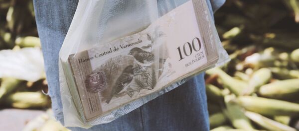 Billetes de bolívares venezolanos (imagen referencial) - Sputnik Mundo