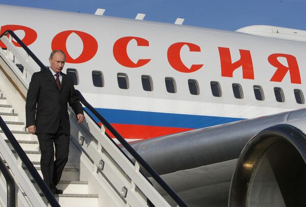 Vladímir Putin, presidente de Rusia, en uno de los aviones presidenciales - Sputnik Mundo