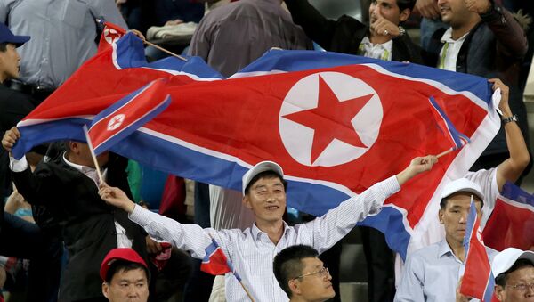 Hinchas norcoreanos (archivo) - Sputnik Mundo