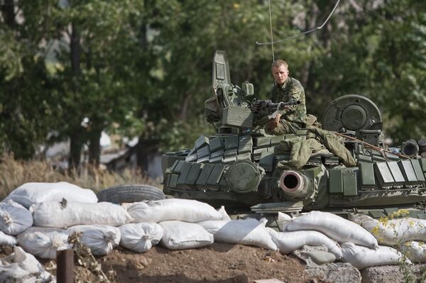 Un tanque ruso en Tsjinval, agosto de 2008 - Sputnik Mundo