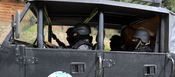 Fuerzas de seguridad venezolanas durante la operación para capturar a Óscar Pérez - Sputnik Mundo