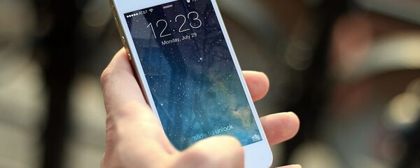 Un iPhone - Sputnik Mundo