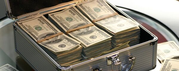 Dólares (imagen referencial) - Sputnik Mundo