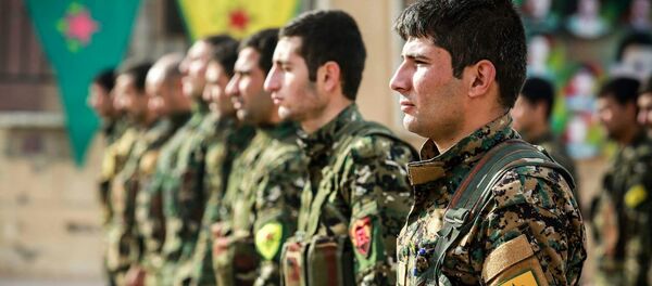 Los combatientes de las Unidades kurdas de Protección Popular (YPG) (imagen referencial) - Sputnik Mundo