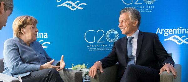 El presidente de Argentina, Mauricio Macri, y la canciller de Alemania, Angela Merkel - Sputnik Mundo