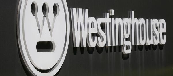 El logotipo corporativo está en un cartel que marca el camino de entrada a la sede internacional de Westinghouse El logotipo corporativo está en un cartel que marca el camino de entrada a la sede internacional de Westinghouse - Sputnik Mundo