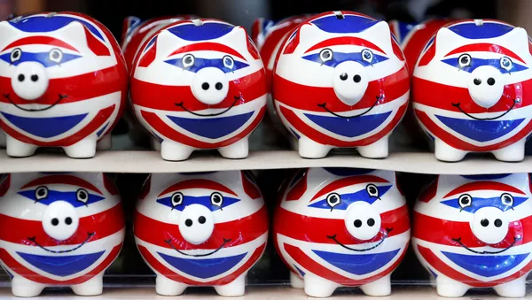 Unos cerditos de porcenala con la bandera del Reino Unido (imagen referencial)