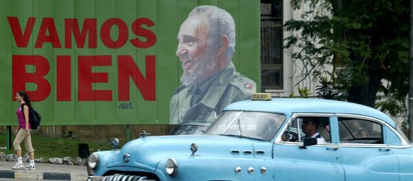 Cartel de Fidel en La Habana, Cuba - Sputnik Mundo