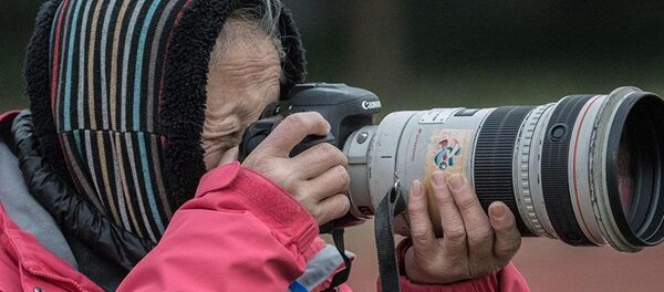 La veterana fotógrafa china Hong Nanli - Sputnik Mundo