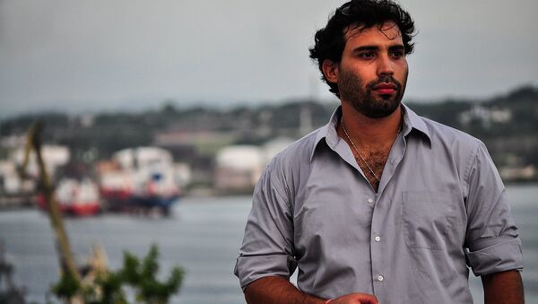 El periodista cubano Julio Batista - Sputnik Mundo