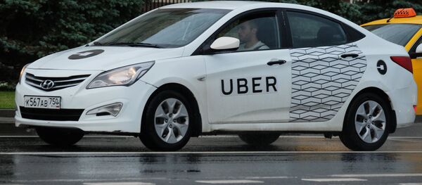Un taxi de Uber - Sputnik Mundo