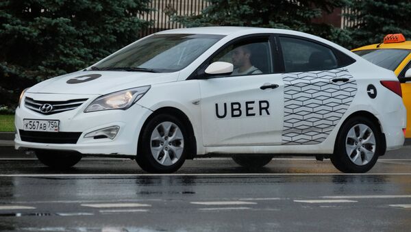 Un taxi de Uber - Sputnik Mundo