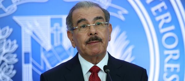 Dominican Republic's President Danilo Medina talks to the media after attending a meeting in Santo Domingo Dominican Republic's President Danilo Medina talks to the media after attending a meeting in Santo Domingo - Sputnik Mundo
