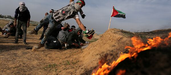 Protestas palestinas en Gaza Protestas palestinas en Gaza - Sputnik Mundo